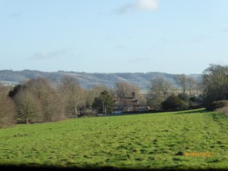 View towards Broughton Lees village with the chalk ridge in the distance
